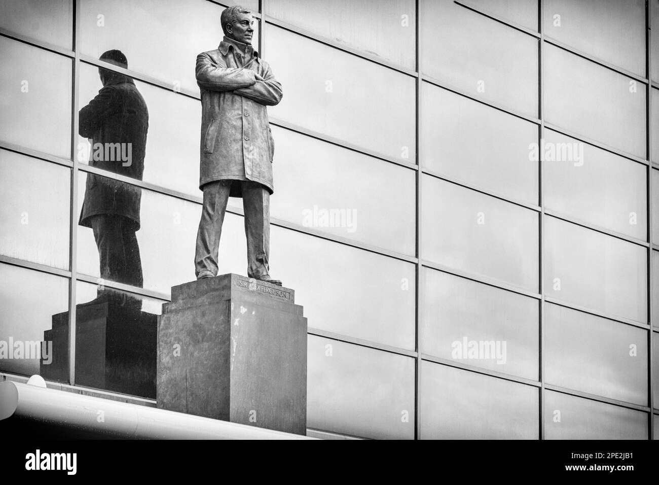 Statue of Sir Alex Ferguson at Old Trafford, Home of Manchester United in Monochrome Stock Photo