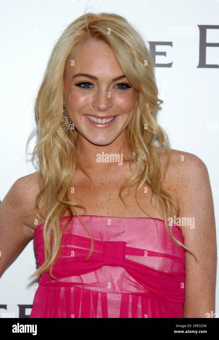 Actress Lindsay Lohan arrives at the grand opening in New York City of