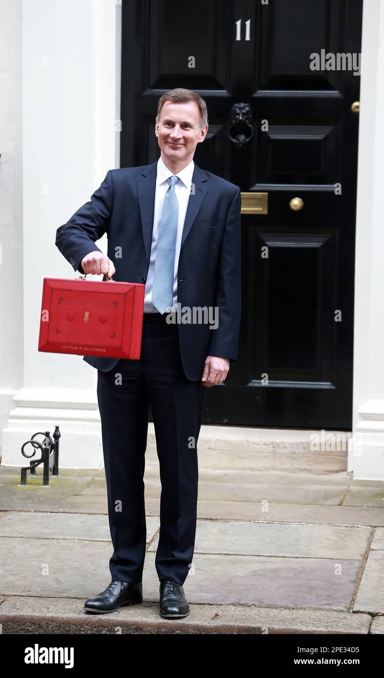 Jeremy Hunt leaves Downing Street with the despatch box to present his spring budget to parliament on March 15, 2023 in London, England. Stock Photo