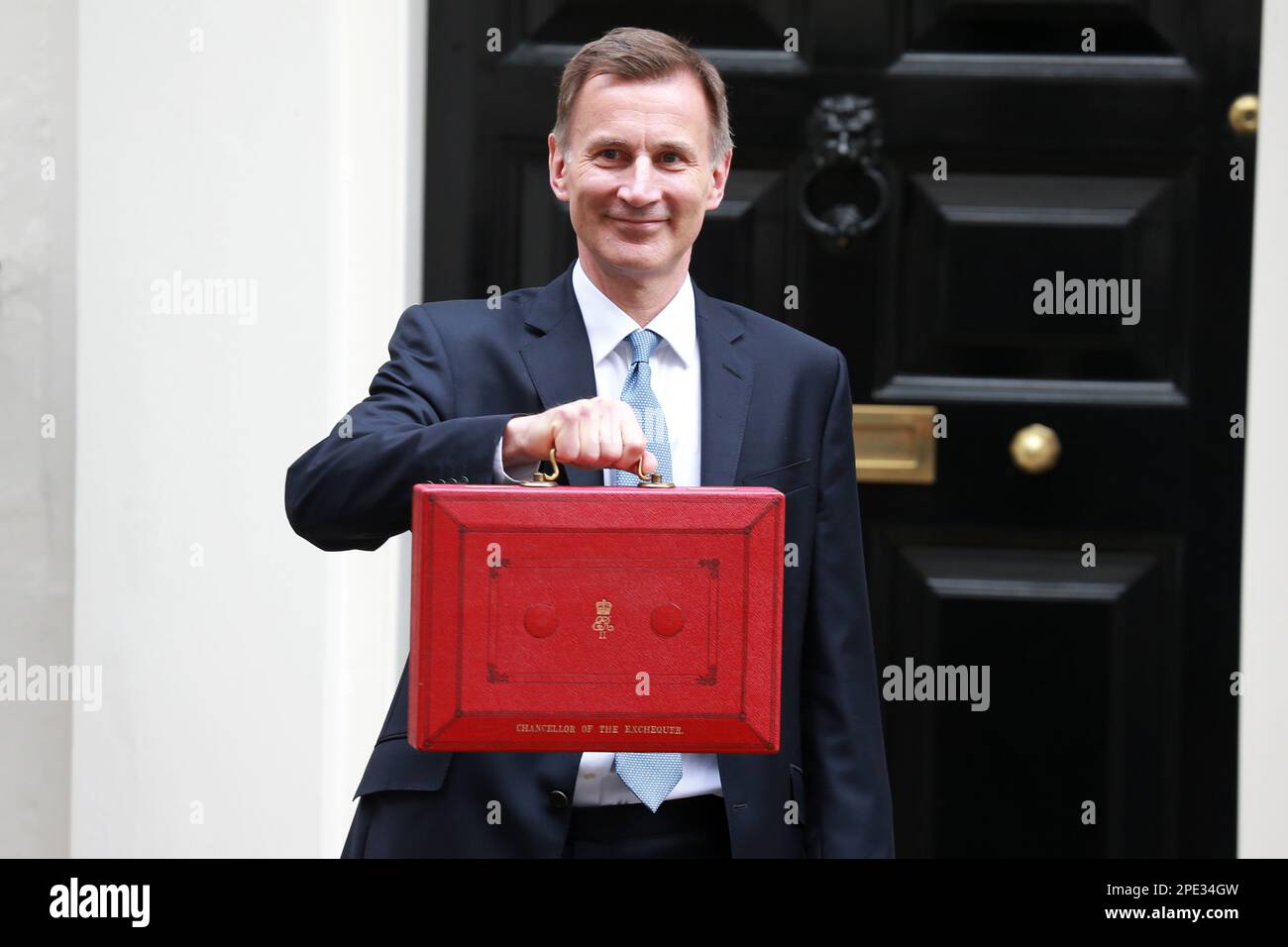 Jeremy Hunt leaves Downing Street with the despatch box to present his spring budget to parliament on March 15, 2023 in London, England. Stock Photo