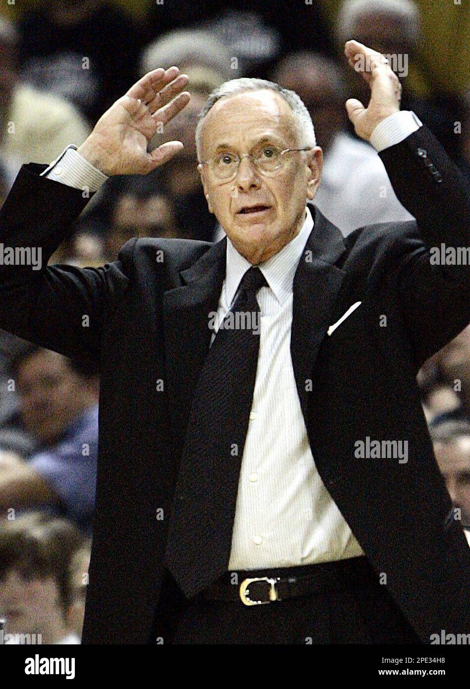 Detroit Pistons coach Larry Brown signals to his team during the second quarter in game six of