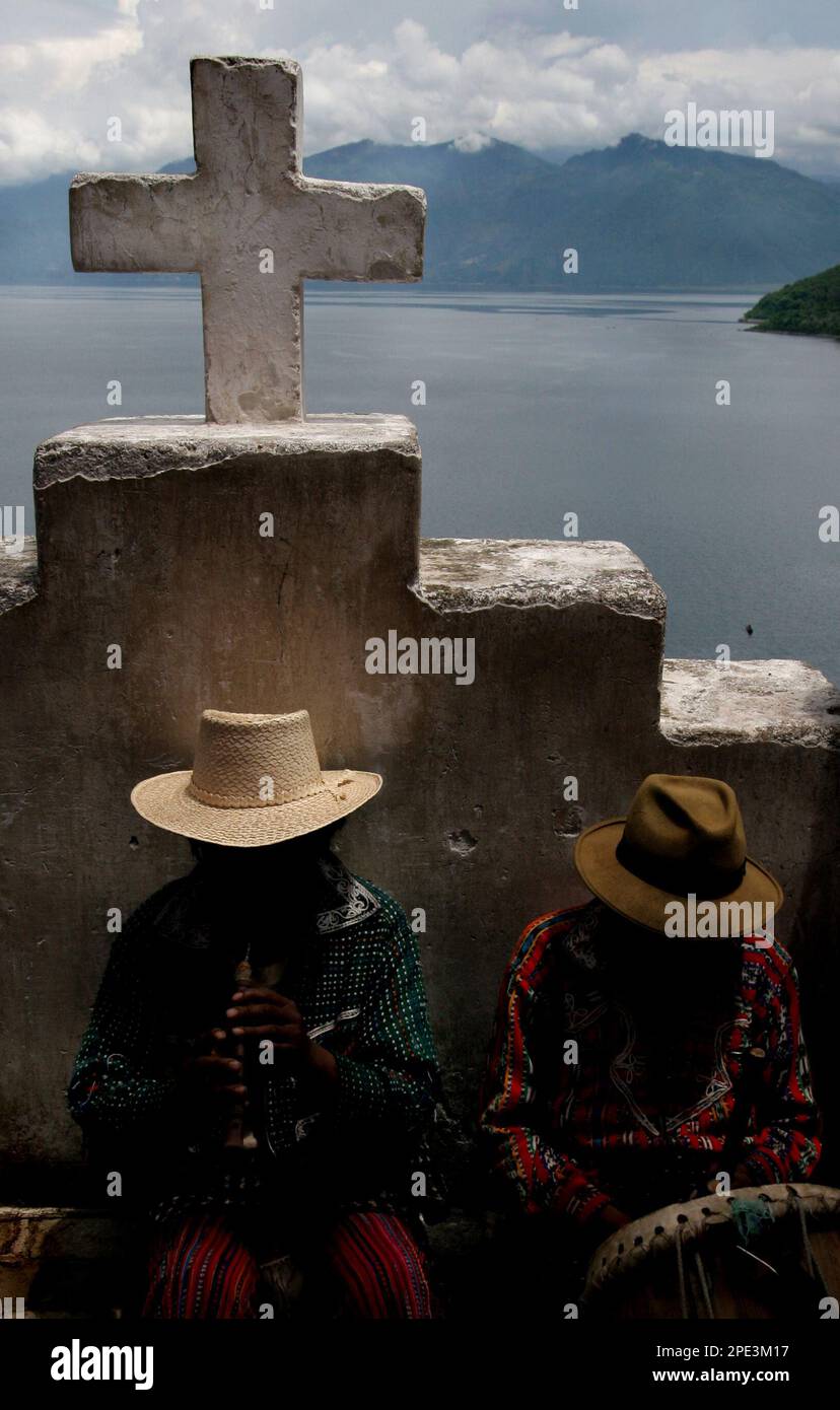 Indigenous Mayans perform local music minutes before the procession in Palopoo Solola 190 km 118 miles west of Guatemala City Monday June 13 2005. Villagers are celebrating the feast of San Antonio