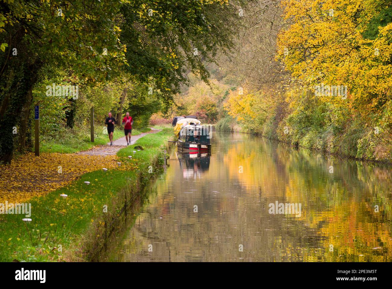 Narrowboats on the Kennet and Avon Canal surrounded by autumn colour ...