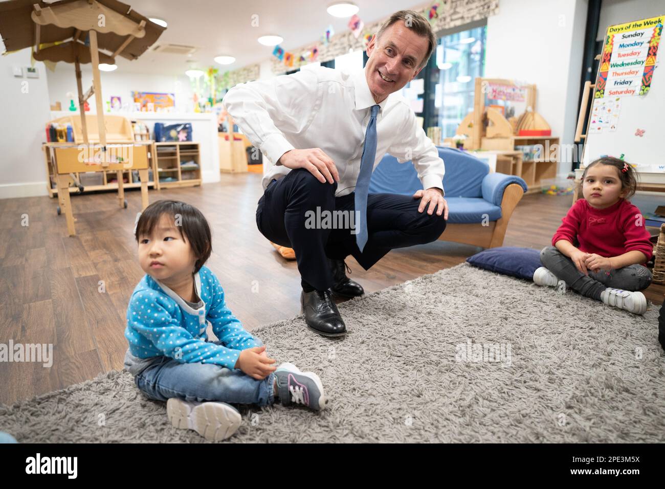 Chancellor of the Exchequer Jeremy Hunt, meeting children during a