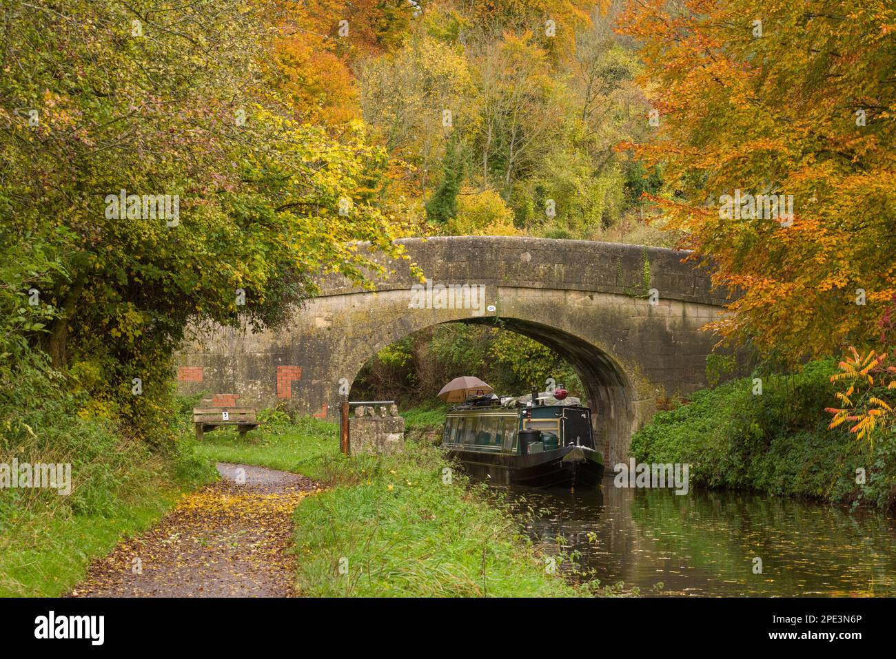 Winsley Bridge on the Kennet and Avon Canal surrounded by autumn colour, Winsley, Wiltshire, England. Stock Photo