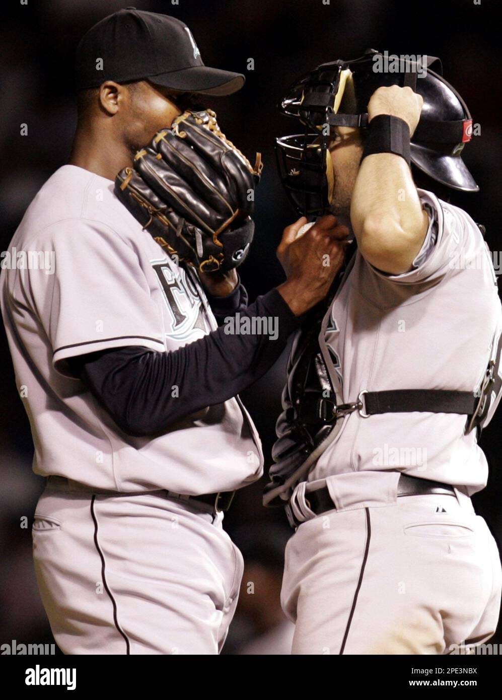 Florida Marlins relief pitcher Guillermo Mota, left, talks to catcher Paul  Lo Duca in the ninth inning against Chicago Cubs at Wrigley Field, Monday,  June 13, 2005 in Chicago. The Marlins won