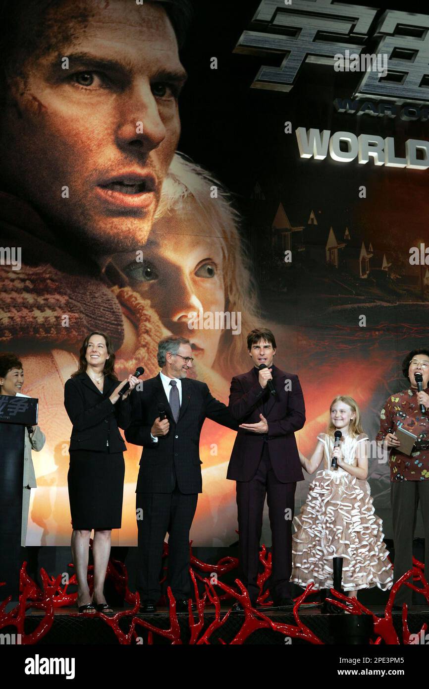 Hollywood star Tom Cruise, third from right, speaks to the audience as he  appears with actress Dakota Fanning, second from right, director Steven  Spielberg, third from left, and producer Kathlene Kennedy, second