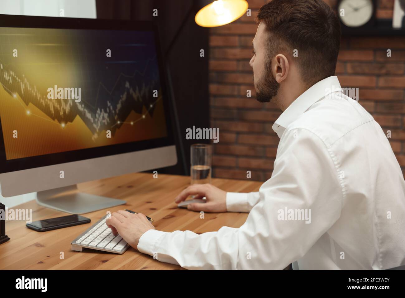 Male trader using computer trade hi-res stock photography and images ...