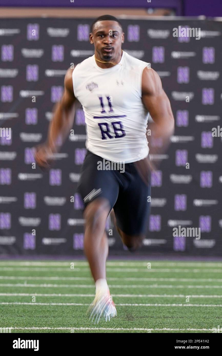 Northwestern running back Andrew Clair participates in a position drill