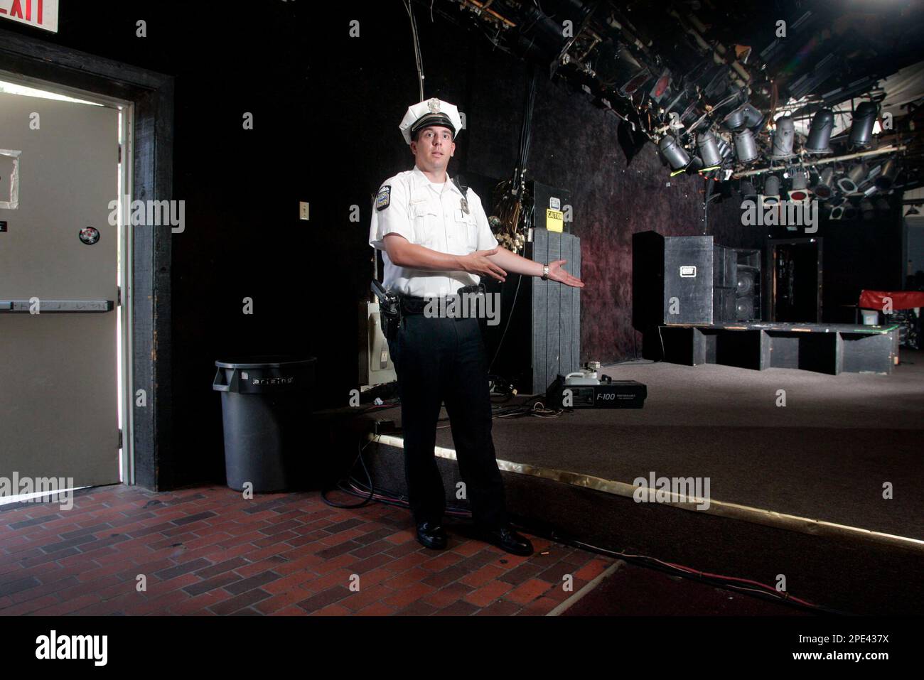 Columbus Police officer James Niggemeyer stands in the Alrosa Villa