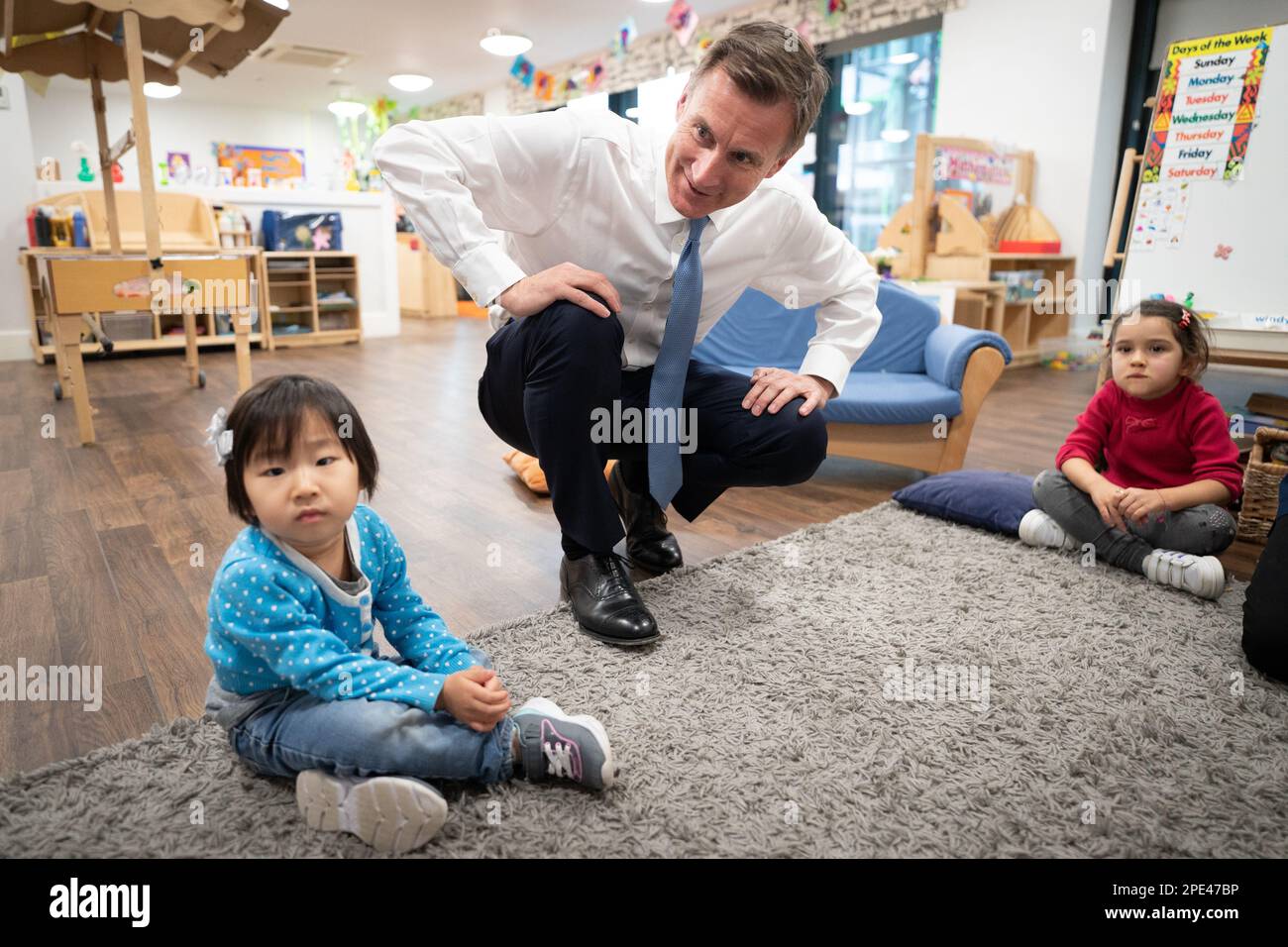 Chancellor of the Exchequer Jeremy Hunt, meeting children during a
