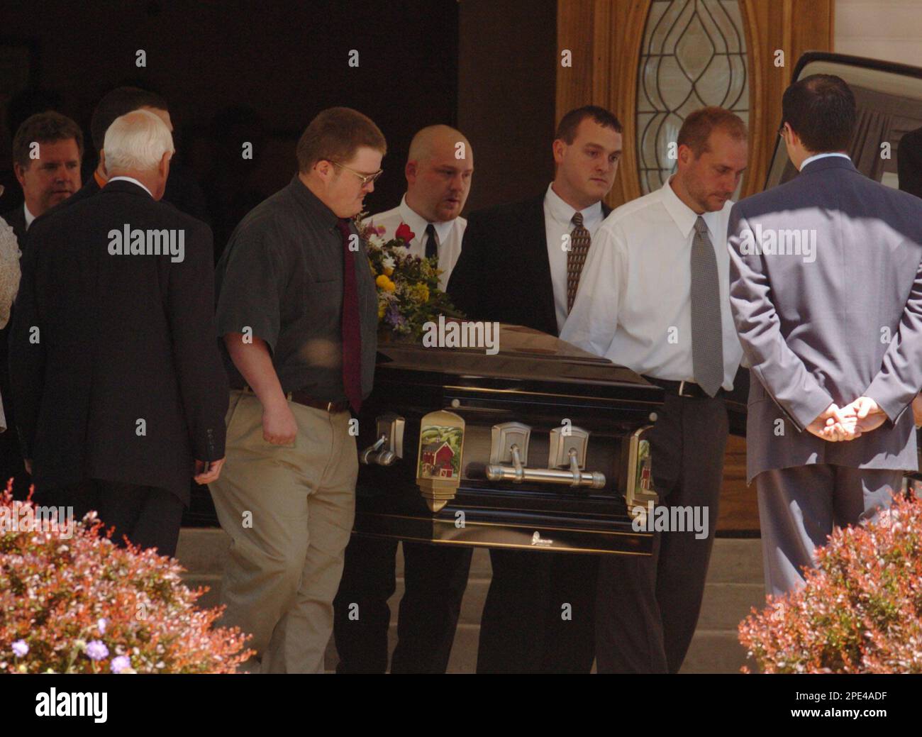 Pallbearers carry the casket of Scott Moody from a funeral home, Monday, June 6, 2005, after his
