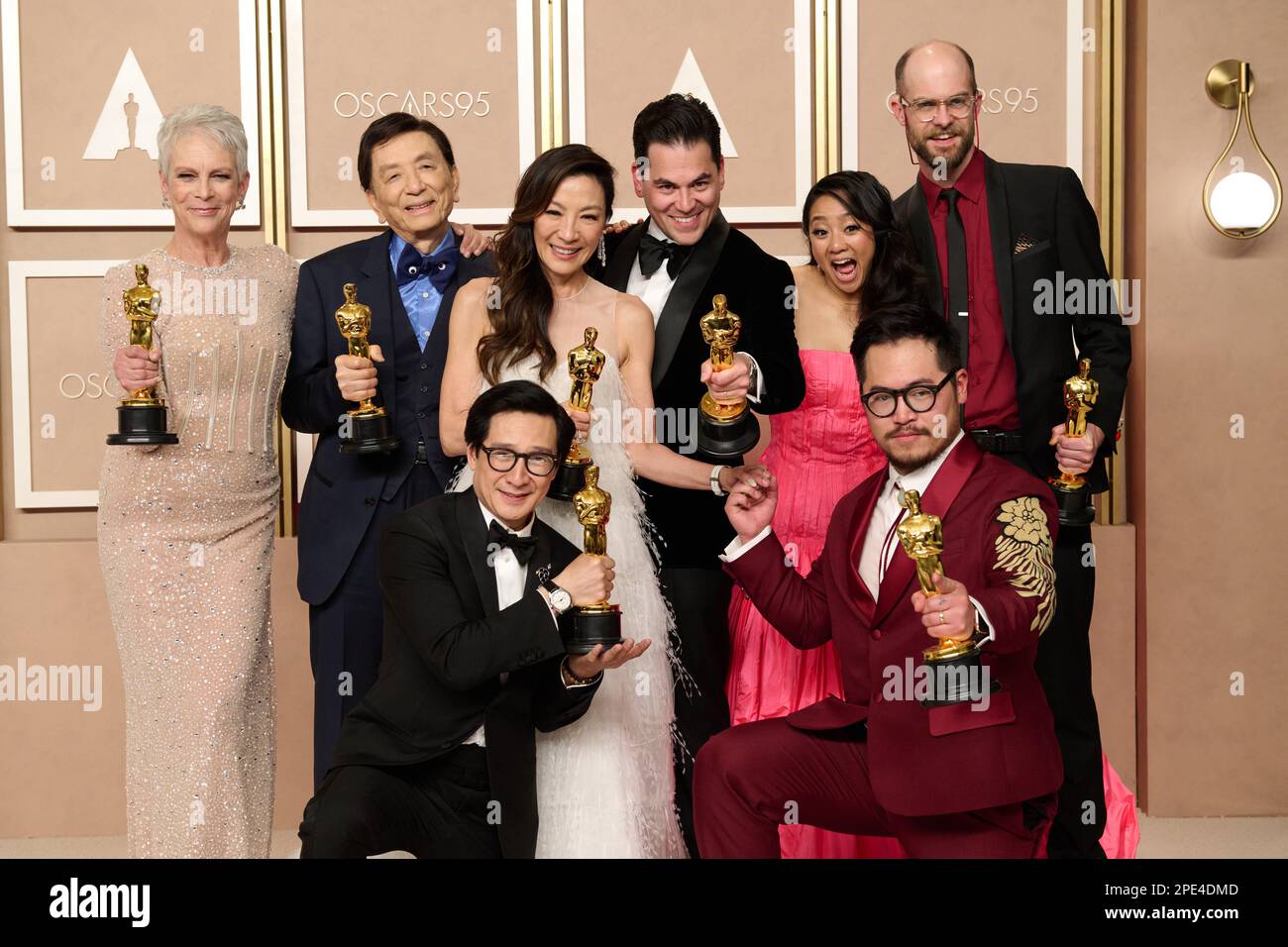 Daniel Kwan, Daniel Scheinert and Jonathan Wang pose with the Oscar for