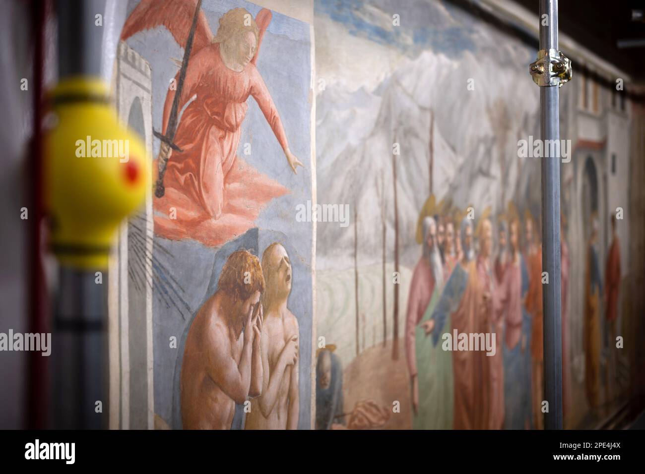 Restoration work in progress on the famous frescoes of the Branacci Chapel in Florence. Small time limited tours allowed amidst the scaffolding Stock Photo