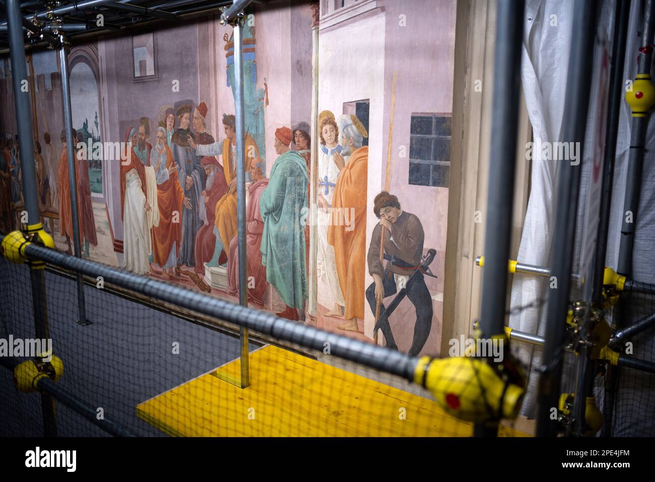Restoration work in progress on the famous frescoes of the Branacci Chapel in Florence. Small time limited tours allowed amidst the scaffolding Stock Photo