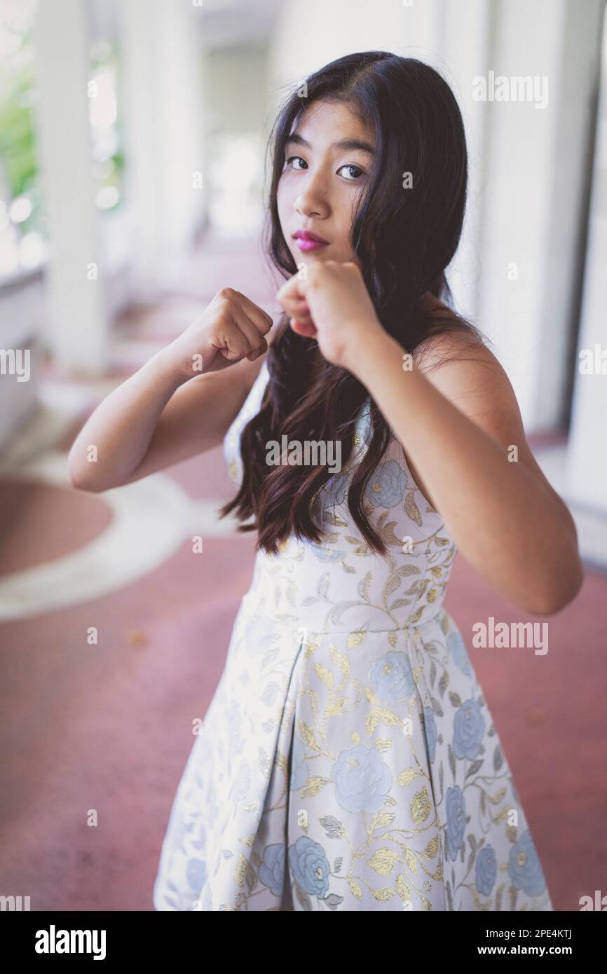 Teenage Girl in Prom Dress Doing Martial Arts Beautiful Asian Teenager Stock Photo Alamy