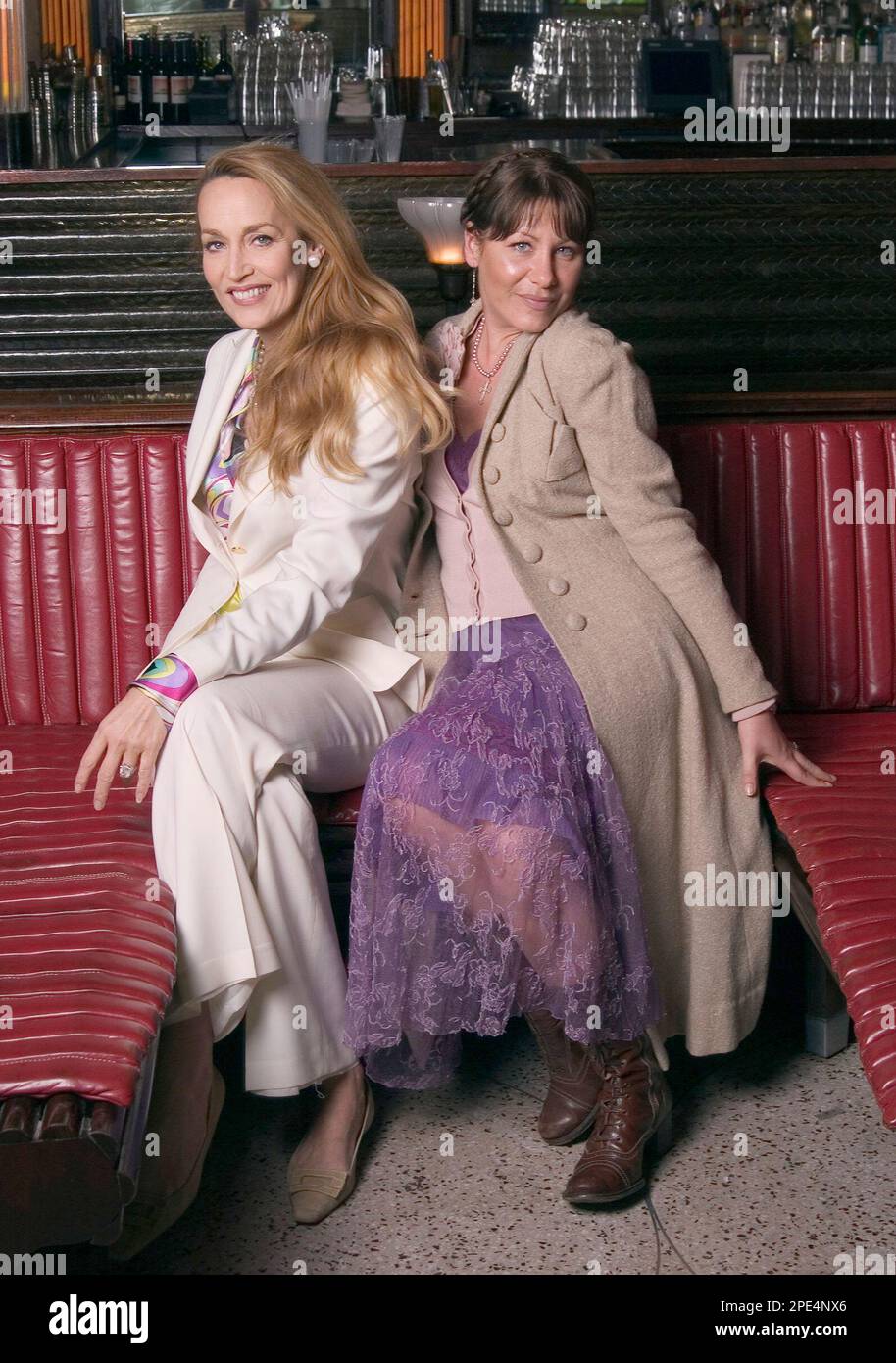 Model and actress Jerry Hall, ex-wife of Mick Jagger, poses with friend Rachel Fuller, right, at La Bottega Cafe at the Maritime Hotel in New York on May 26, 2005
