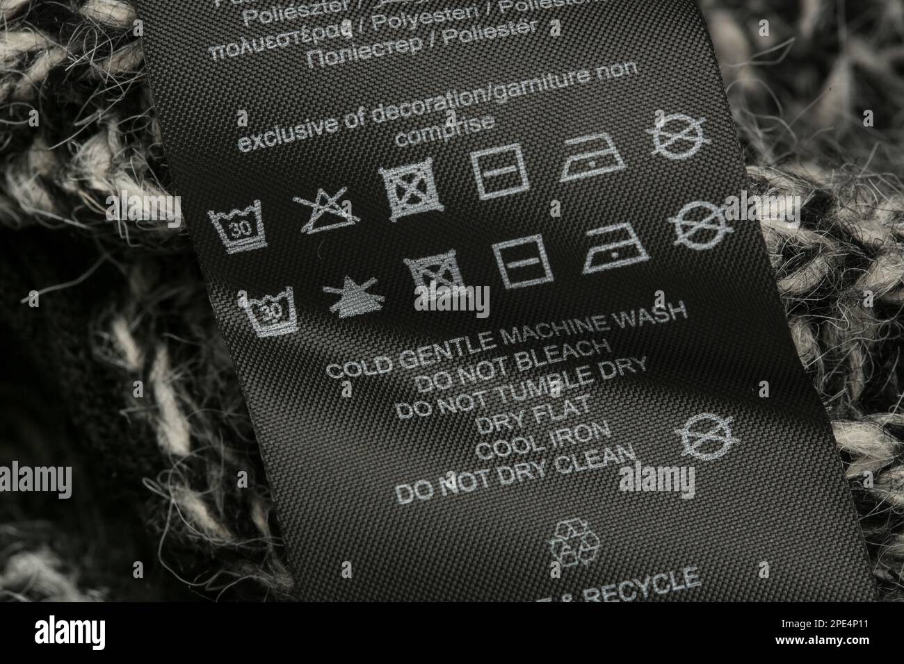 Fabric composition label, Washing instructions and recycling sign on