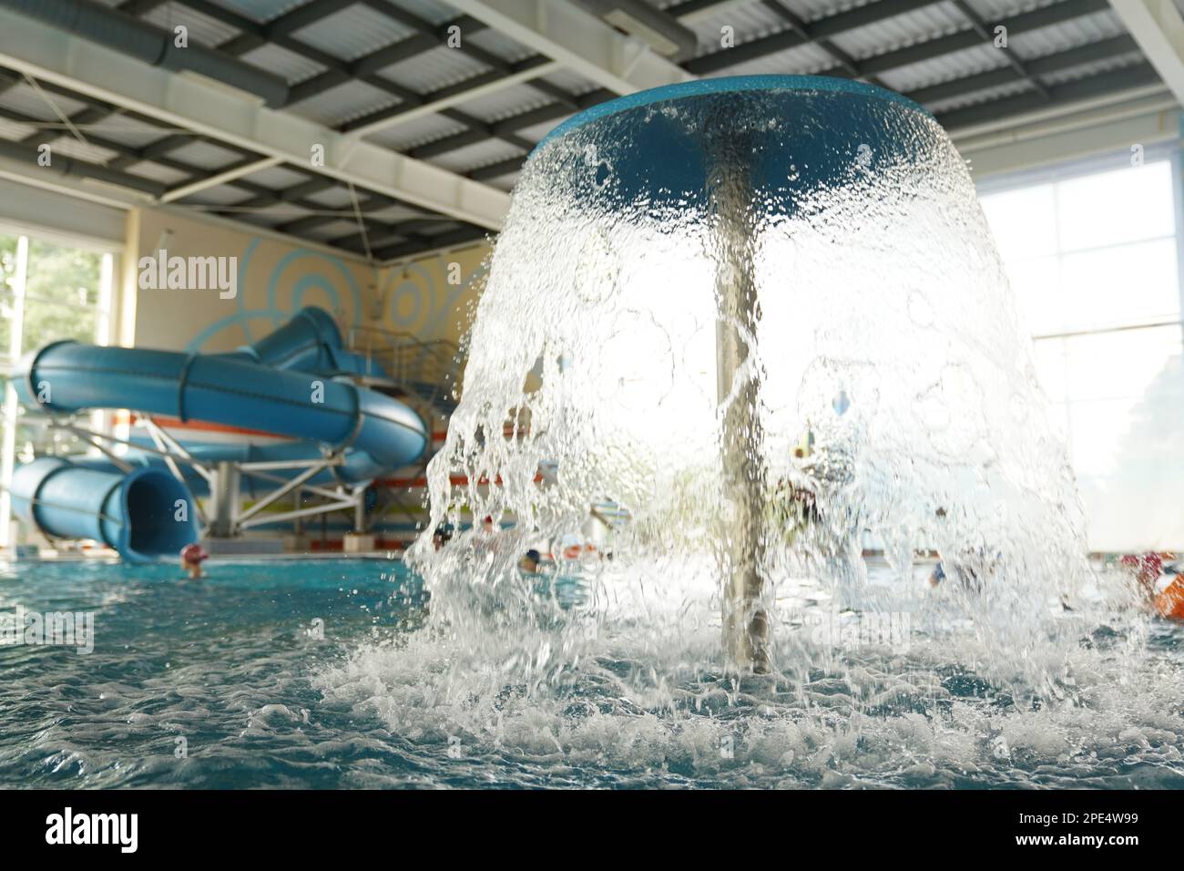 Decorative mushroom with shower in the water park Stock Photo - Alamy