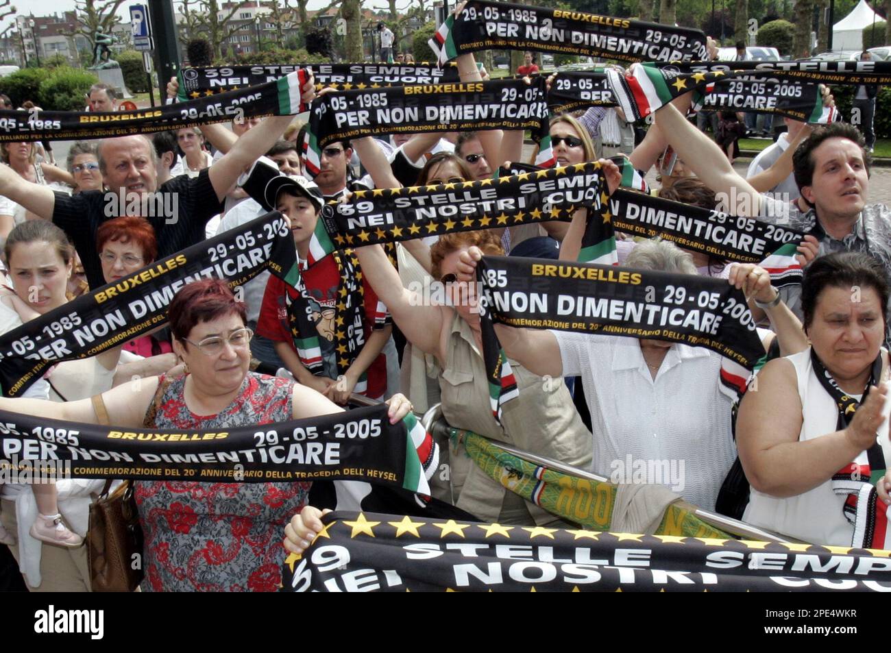 Juventus soccer fans show their scarves to remember the Heysel tragedy at  the King Baudouin stadium in Brussels, Sunday May 29, 2005. Fans from  Britain, Italy and Belgium marked the Heysel tragedy