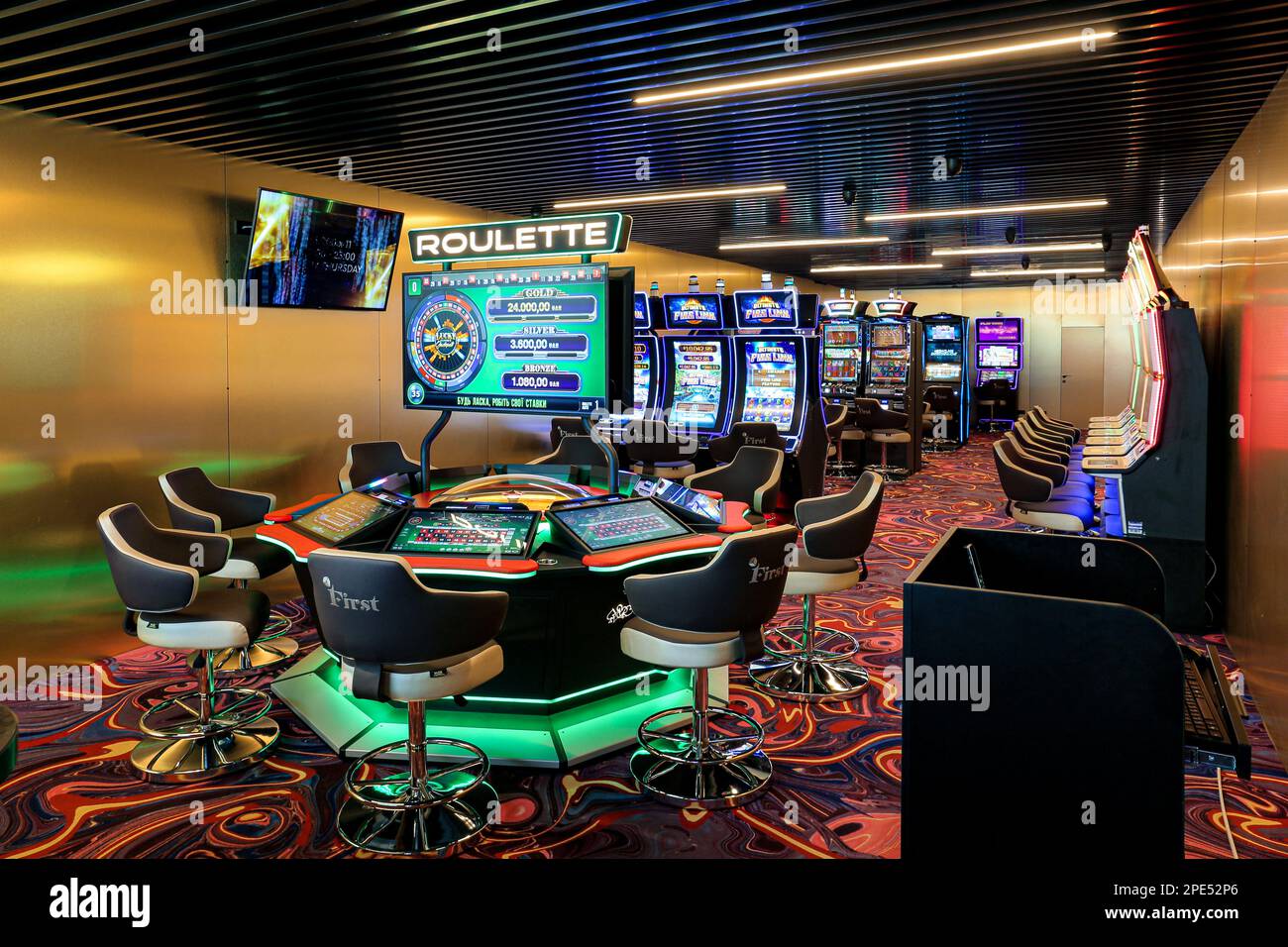 Nikolaev, Ukraine, - October 21, 2021: slot machines of the casino 'First' in the hotel 'Green Day'. Deluxe Game Club in the hotel. Stock Photo