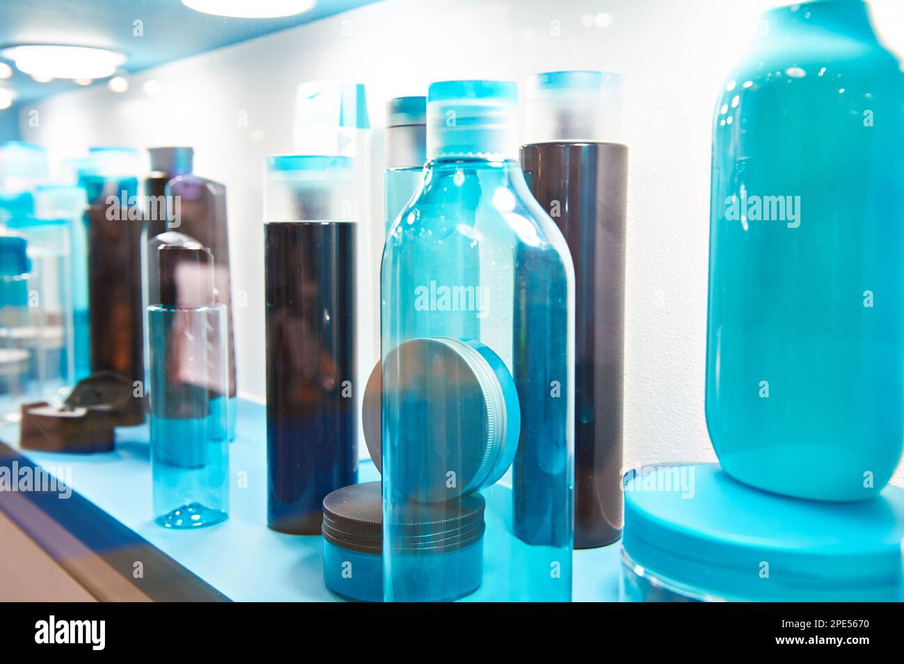 Showcase shop with plastic bottles and jars cosmetic and shampoo Stock Photo