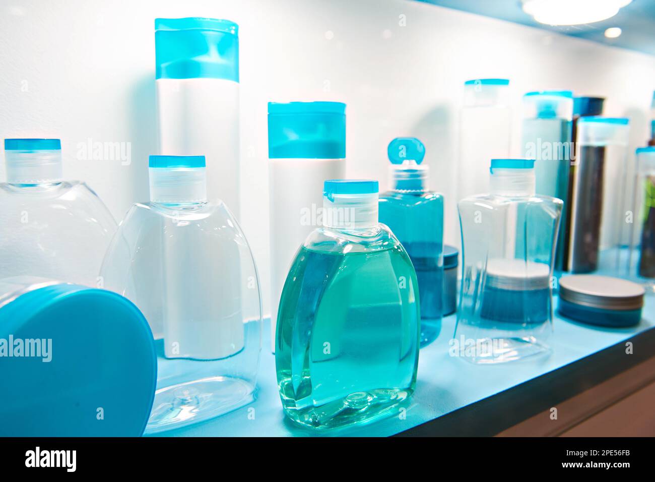 Showcase shop with plastic bottles and jars cosmetic and shampoo Stock Photo