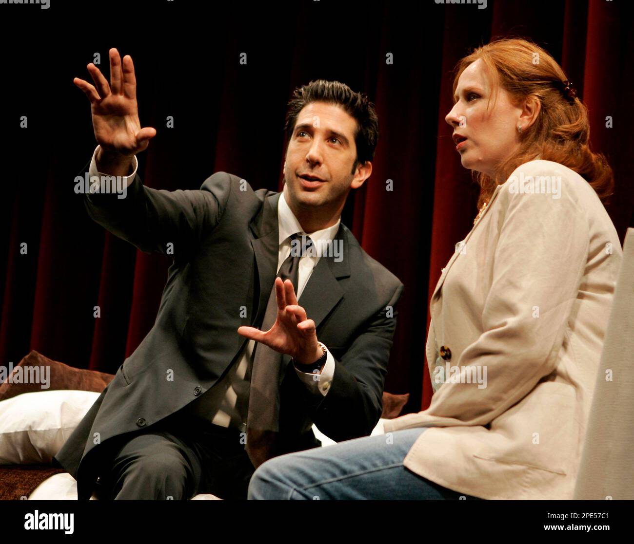 U.S. actor David Schwimmer, left, and British actress Catherine Tate, act a  scene from the play 