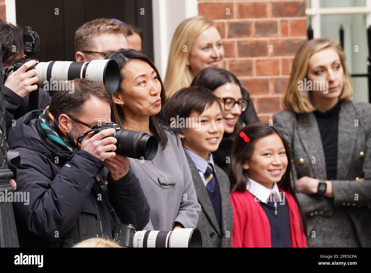 RETRANSMITTING AMENDING CAPTION Chancellor of the Exchequer Jeremy Hunt's wife Lucia Hunt and their children watch as he leaves 11 Downing Street, London, with his ministerial box, before delivering his Budget at the Houses of Parliament. Picture date: Wednesday March 15, 2023. See PA story POLITICS Budget. Photo credit should read: Stefan Rousseau/PA Wire Stock Photo