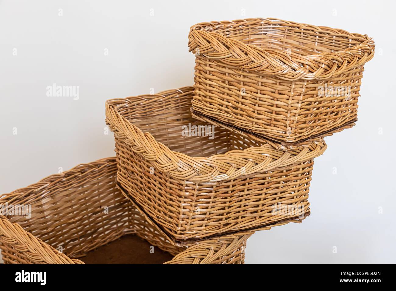 products from a rod. wickerwork is a traditional folk craft. handmade. Stock Photo