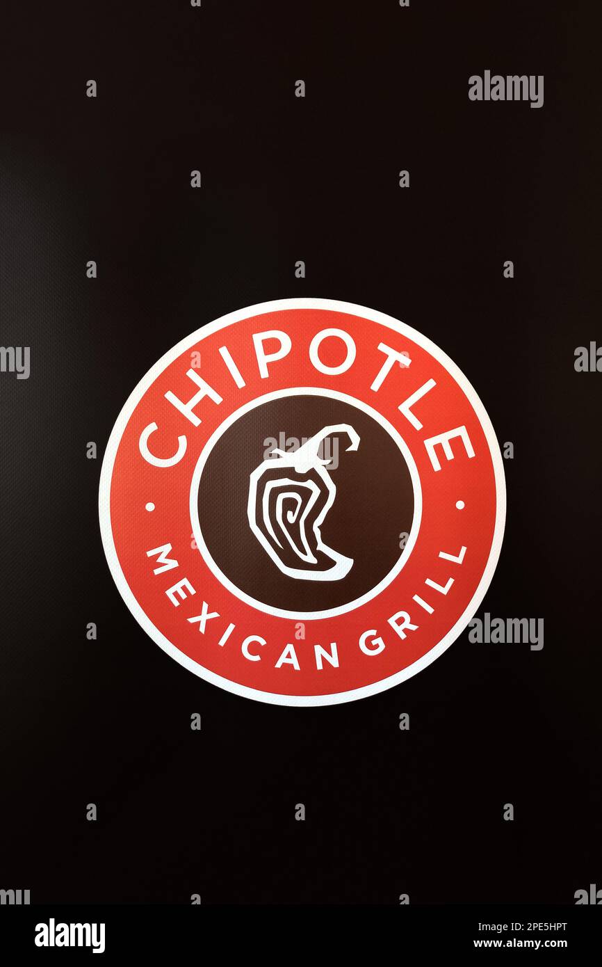ST. PAUL, MN, USA - FEBRUARY 26, 2023: Chipolte Mexican Grill trademark logo close-up. Stock Photo