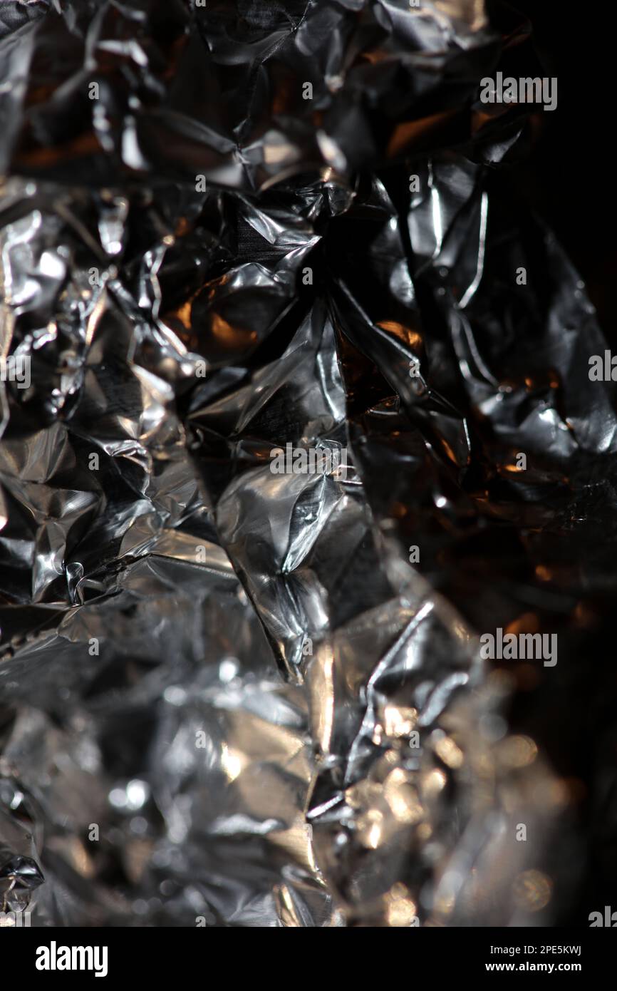 https://c8.alamy.com/comp/2PE5KWJ/abstract-crumpled-colorful-aluminum-foil-texture-close-up-modern-background-big-size-instant-stock-photography-prints-2PE5KWJ.jpg