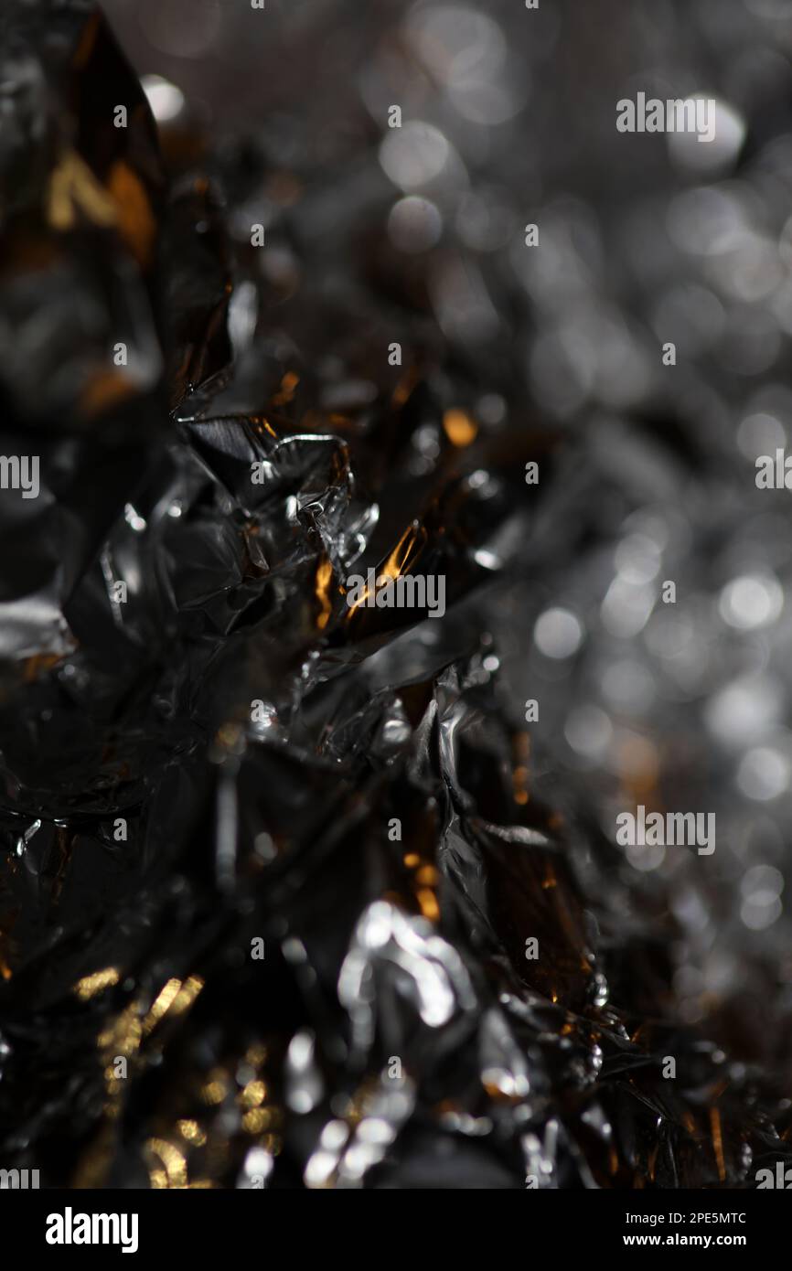 https://c8.alamy.com/comp/2PE5MTC/abstract-crumpled-colorful-aluminum-foil-texture-close-up-modern-background-big-size-instant-stock-photography-prints-2PE5MTC.jpg