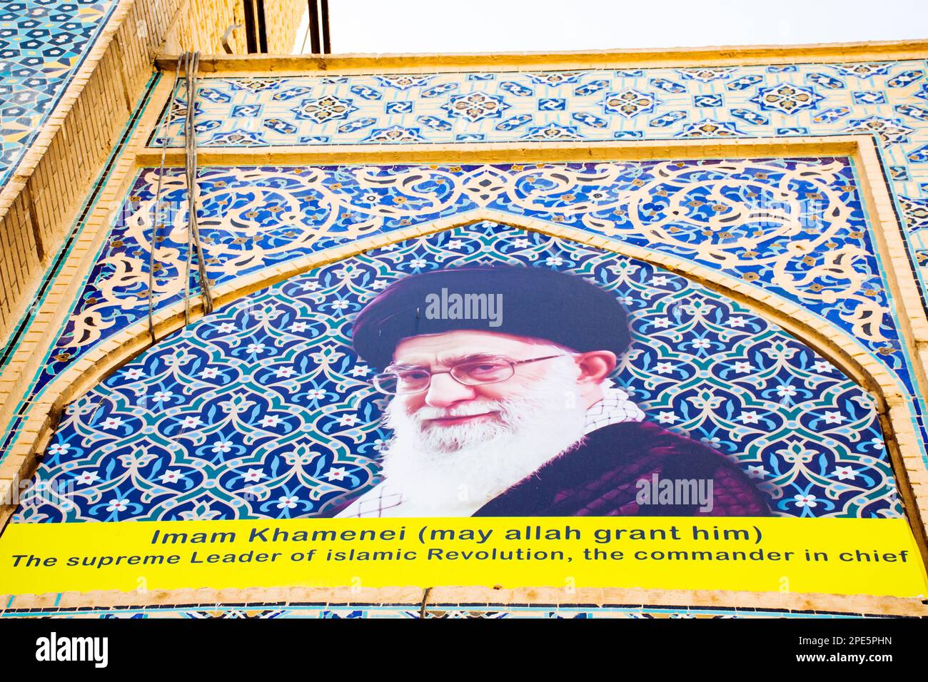 Iran, Isfahan - 15th june, 2022: Imam Khamenei - supreme leader of Iran display. Portrait in isfahan square. Tilework Stock Photo