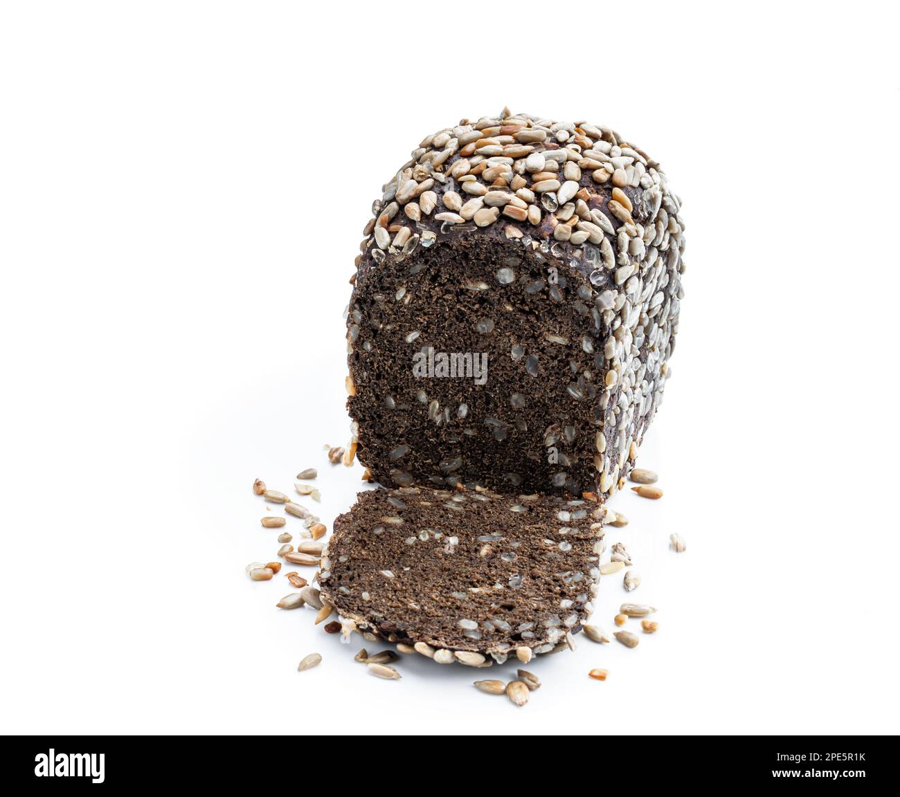 Homemade dark rye bread with sunflower seeds isolated on white Stock