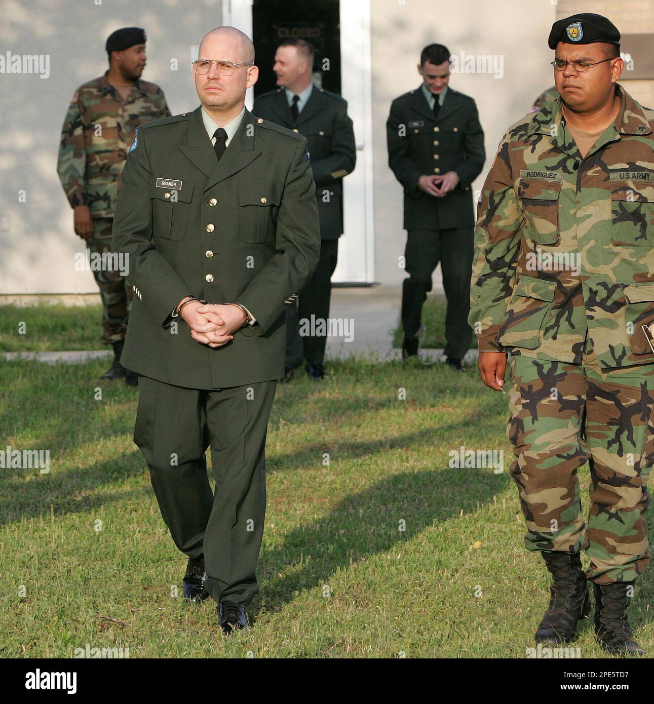 U.S. Army Pvt. Charles Graner Jr., left, is escorted from the