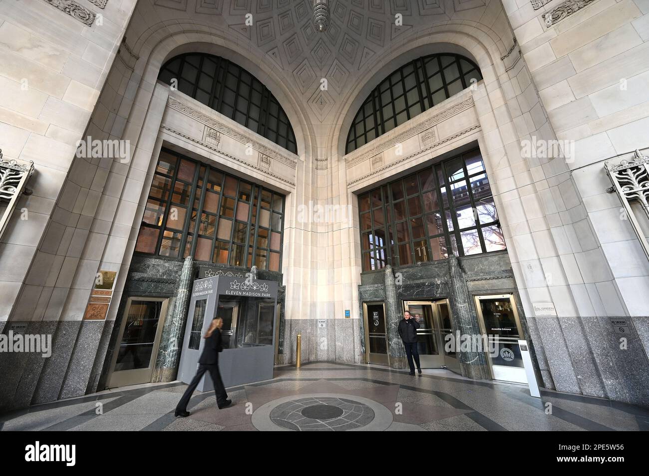 New York, USA. 15th Mar, 2023. A person walks to the entrance of the Suisse Credit New York City office building as reports of the bank shares fall after lenders rule out continued support, New York, NY, March 15, 2023. Share of the bank fell sharply as lenders signaled little help in the near future. (Photo by Anthony Behar/Sipa USA) Credit: Sipa USA/Alamy Live News Stock Photo