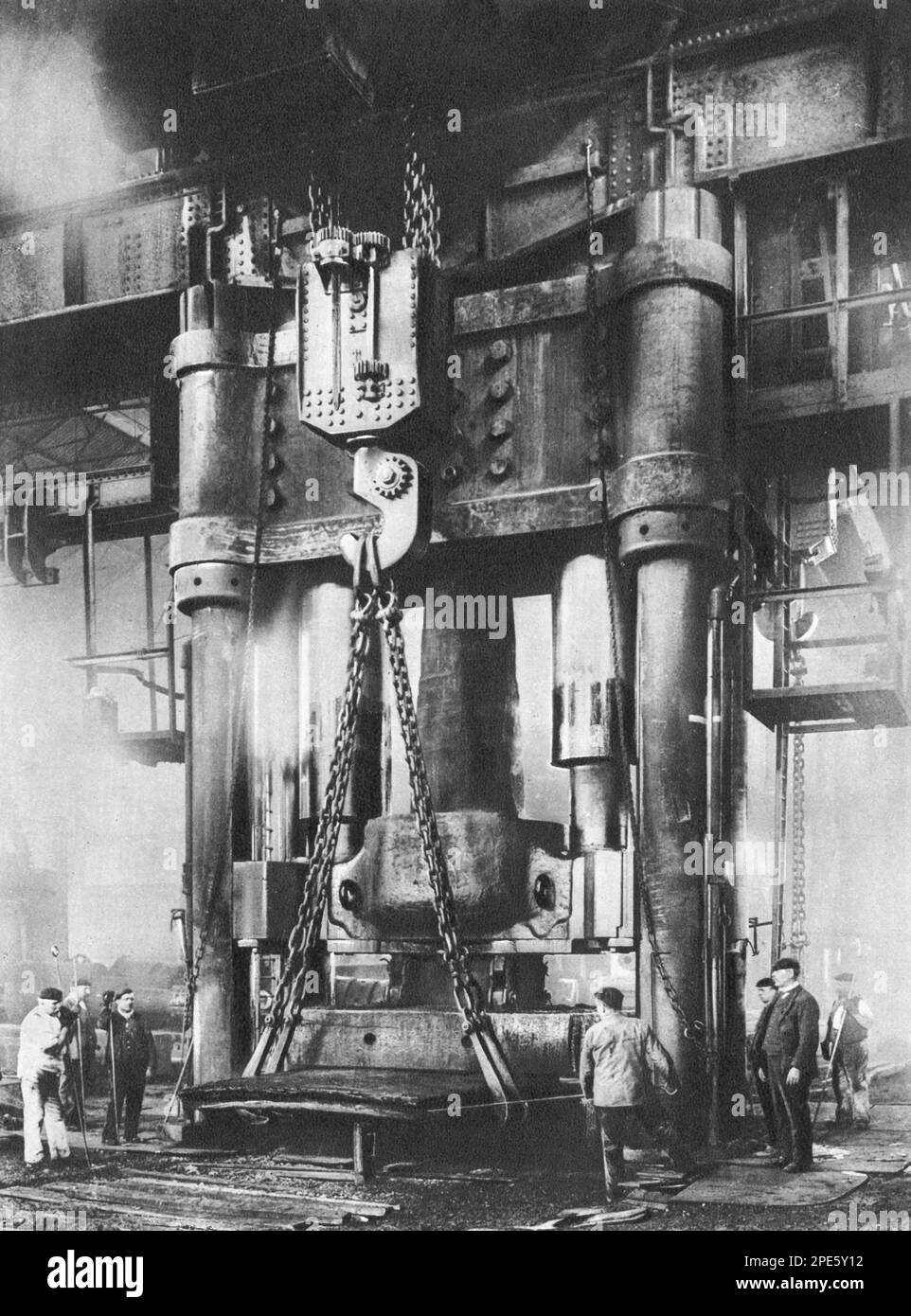 A hydraulic power press, c1933. A hydraulic press is a machine press which uses a hydraulic cylinder to generate a compressive force. It uses the hydraulic equivalent of a mechanical lever. It is also known as a Bramah press after its English inventor, Joseph Bramah (1748-1814). Stock Photo