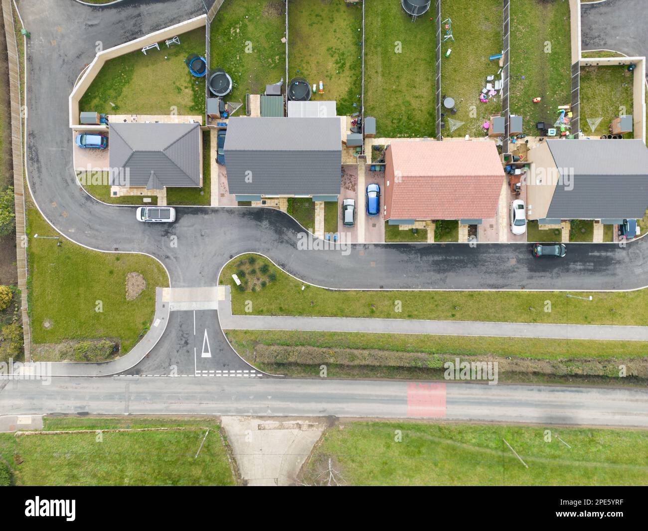 Drone top down view of a new housing development previously on a brown field site in the heart of the English countryside. Stock Photo