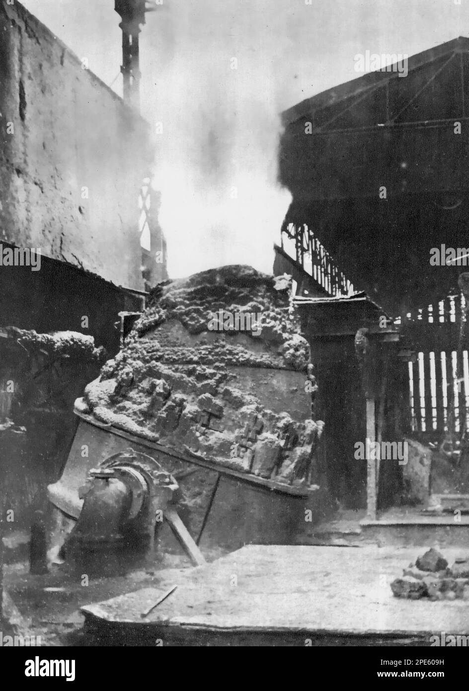 A Bessemer Converter being blown, c1933. The Bessemer process was the first inexpensive industrial process for the mass-production of steel from molten pig iron. The process is named after its inventor, Henry Bessemer (1813-1898). Bessemer took out a patent on the process in 1855. Stock Photo