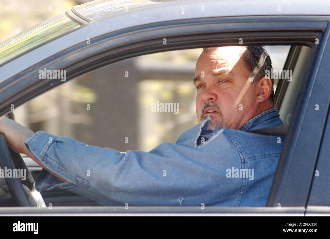 A worker at the Portsmouth Naval Shipyard in Kittery, Maine, leaves the
