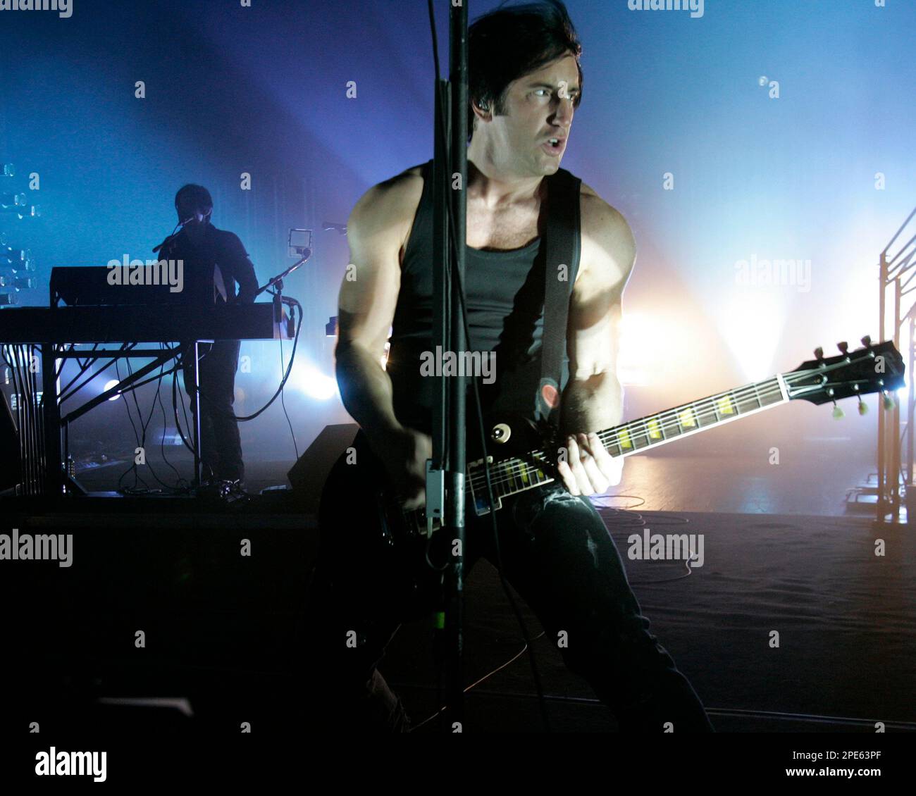 Lead singer of the rock band Nine Inch Nails Trent Reznor performs with