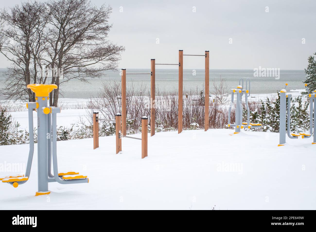 Outdoor workout gym with training gear covered with snow in winter Stock Photo