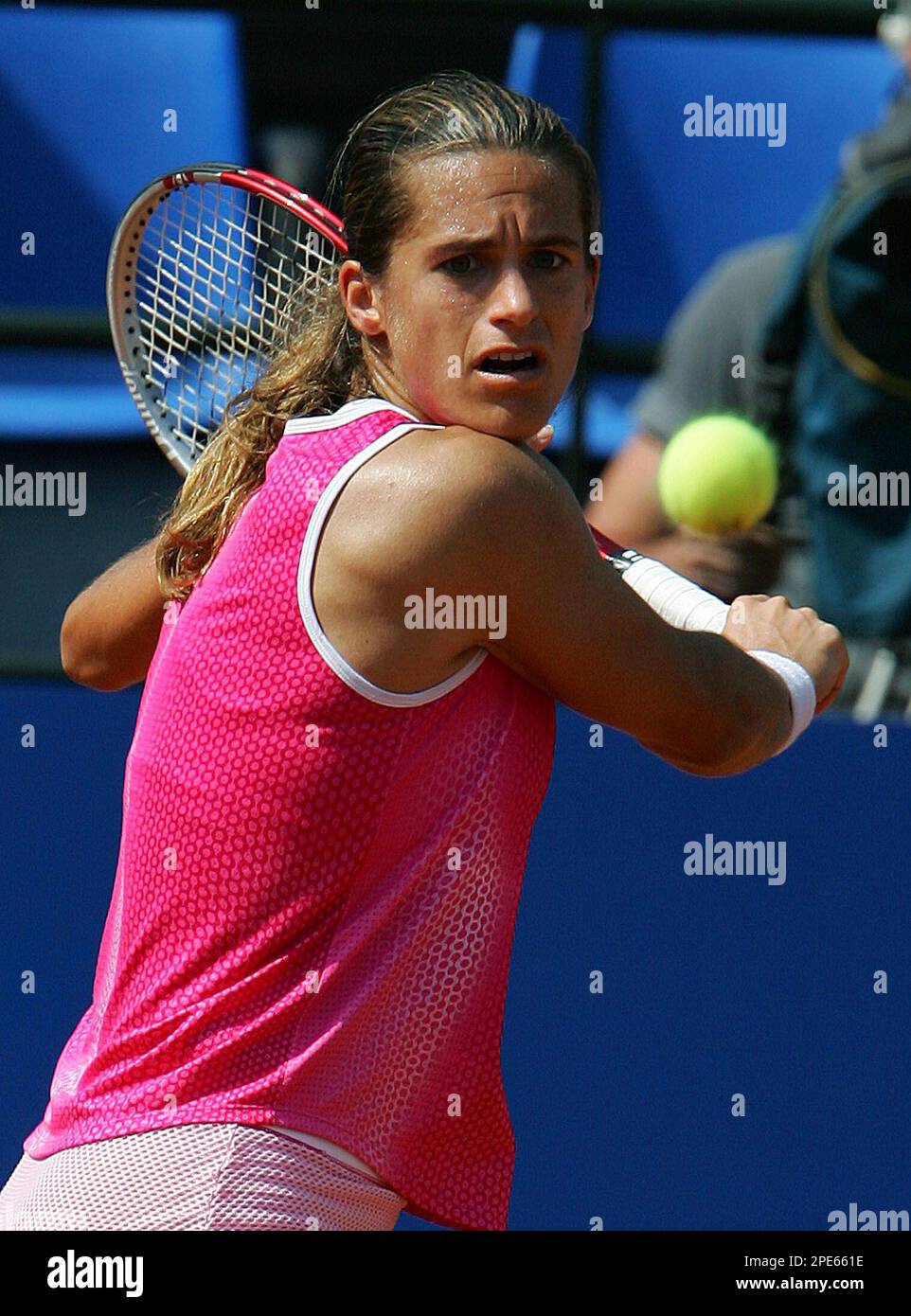 Amelie Mauresmo of France returns a ball to Silvia Farina of Italy during  their match at the Italian Open tennis tournament in Rome's Foro Italico  sports complex, Thursday, May 12, 2005. (AP