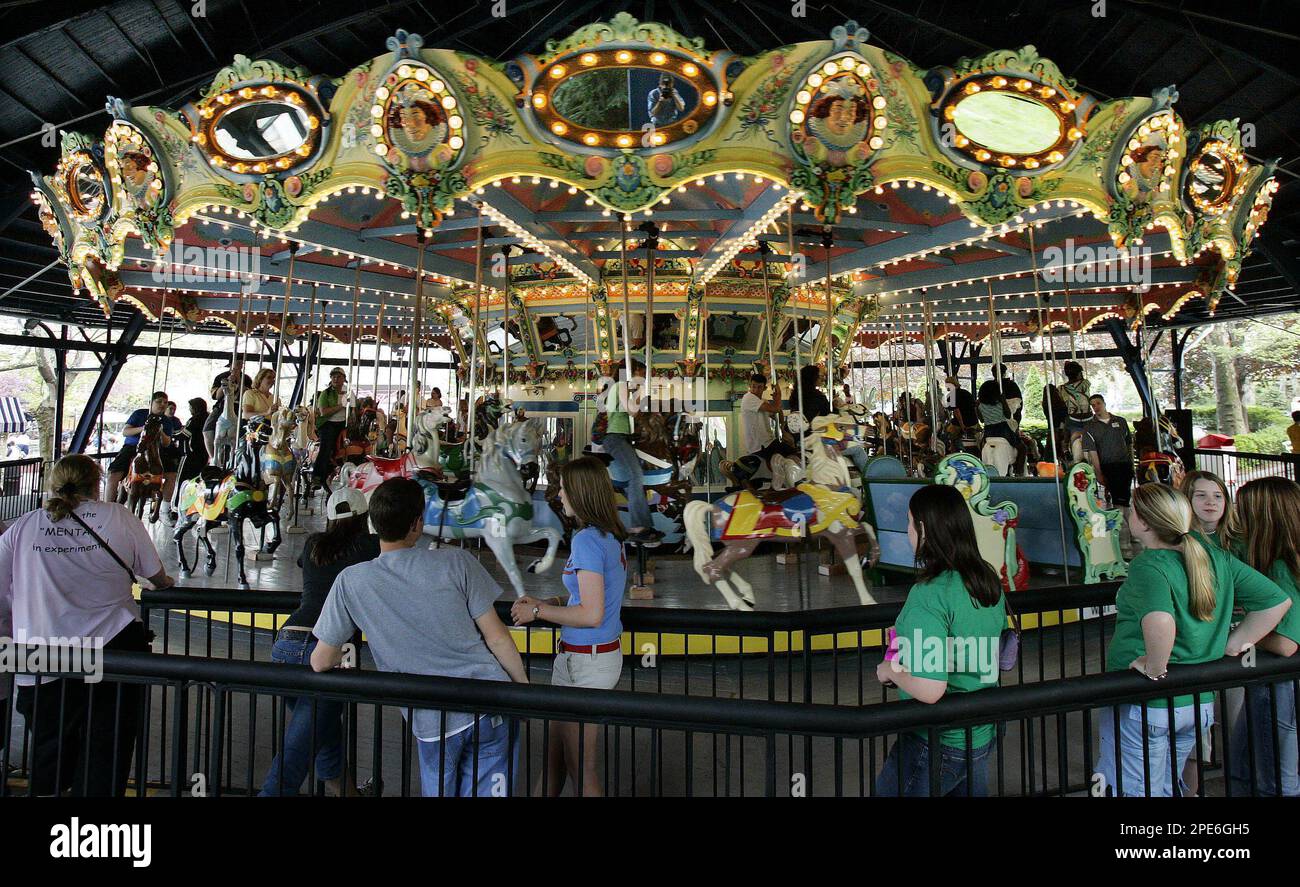The 1926 wooden carousel at Kennywood Park in West Mifflin, Pa., twirls ...