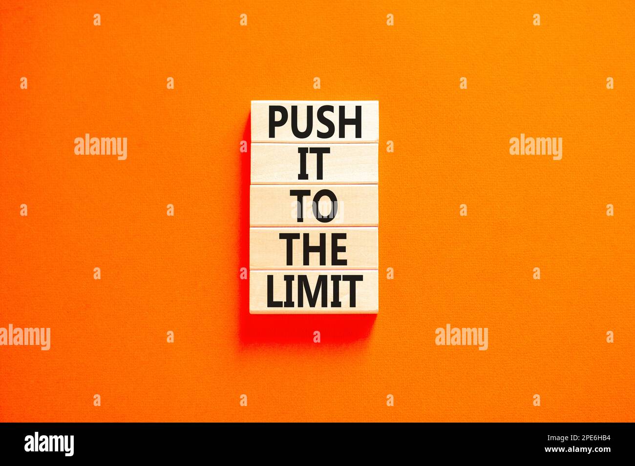 Push it to the limit symbol. Concept words Push it to the limit on wooden blocks. Beautiful