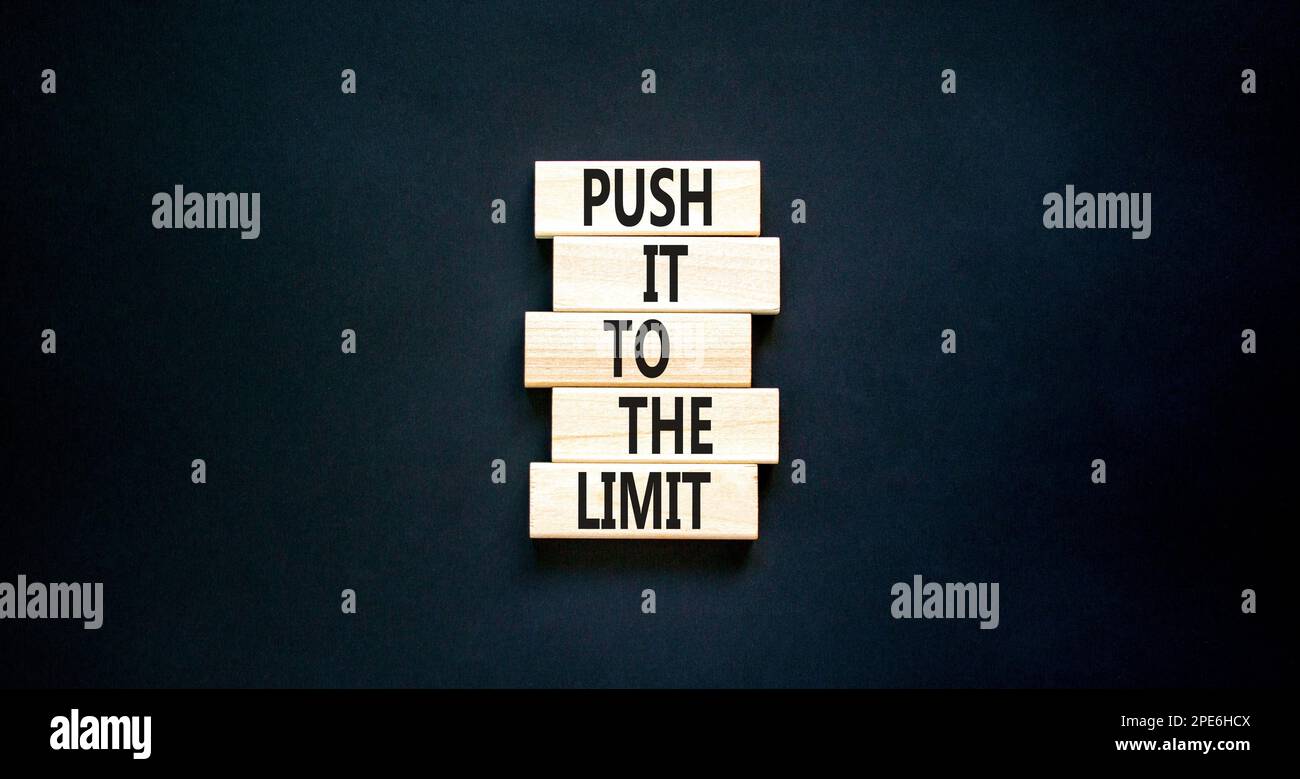 Push it to the limit symbol. Concept words Push it to the limit on wooden blocks. Beautiful