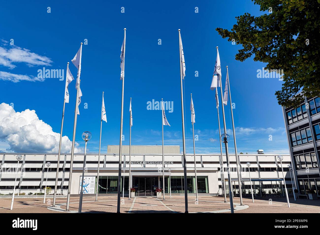 Flags for the anniversary of autonomy, Parliament building, Mariehamn, Aland, Aland Islands, Finland Stock Photo