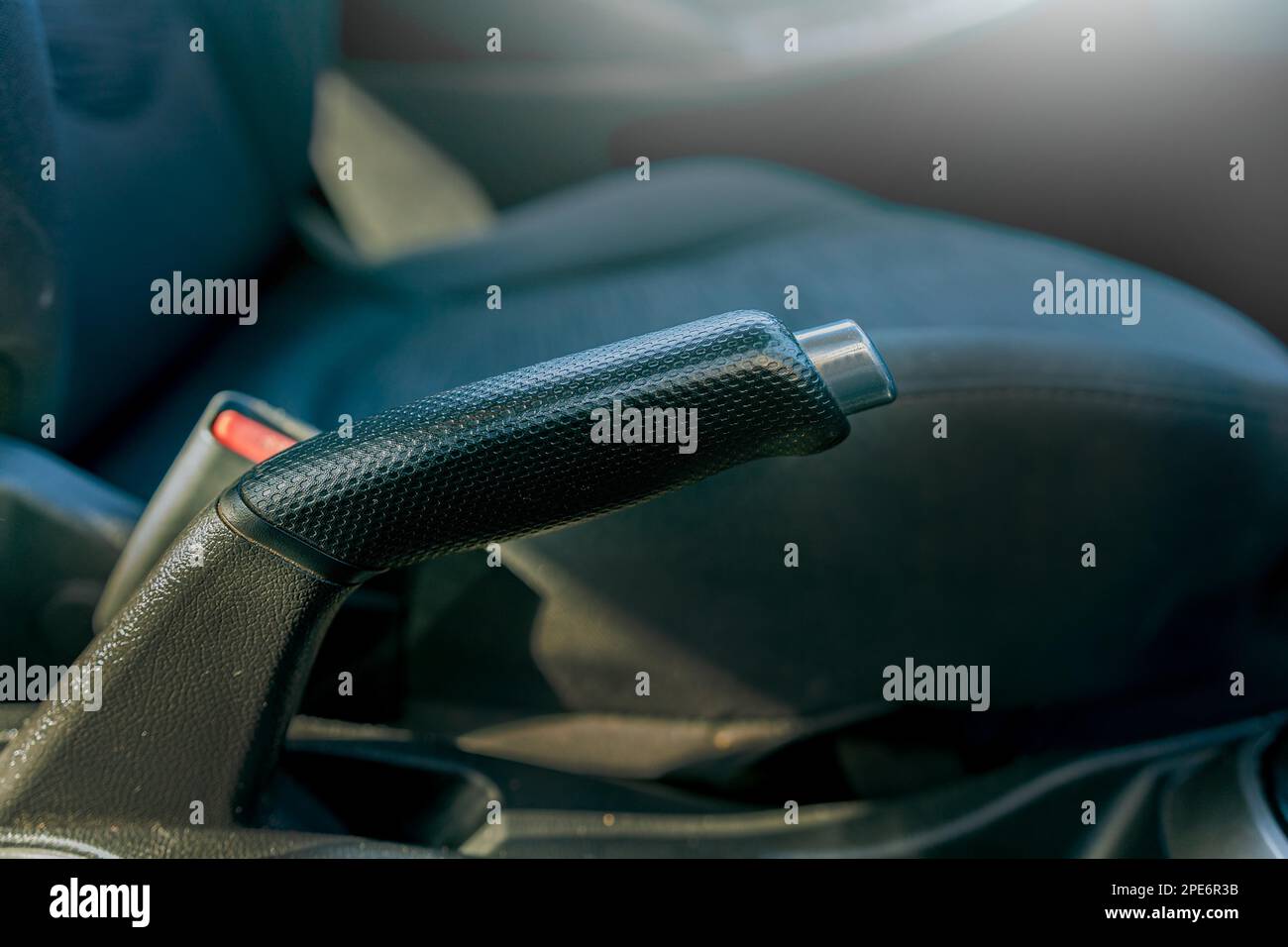 Handbrake of a car. Close up of the parking brake of a car. Car