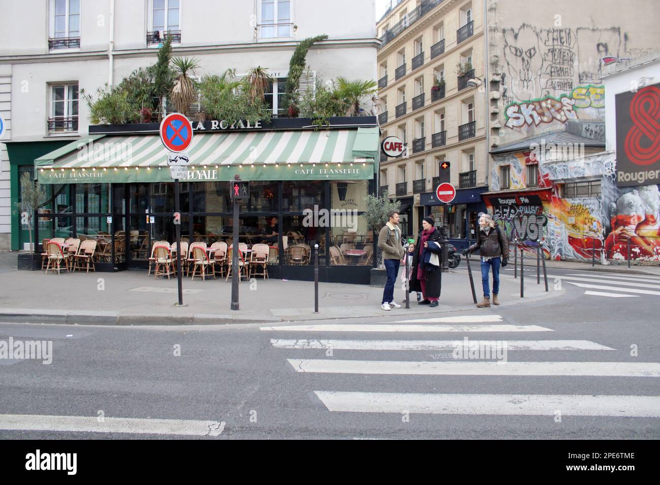 Corner view of the Bd des Filles du Calvaire and Rue Commines with La Royale bar and brasserie in the background here located in Paris France. Stock Photo